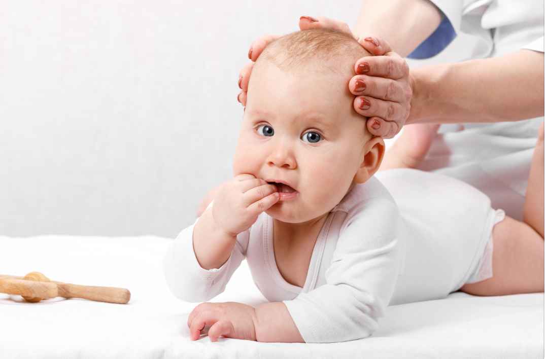 baby laying on belly for chiropractic care
